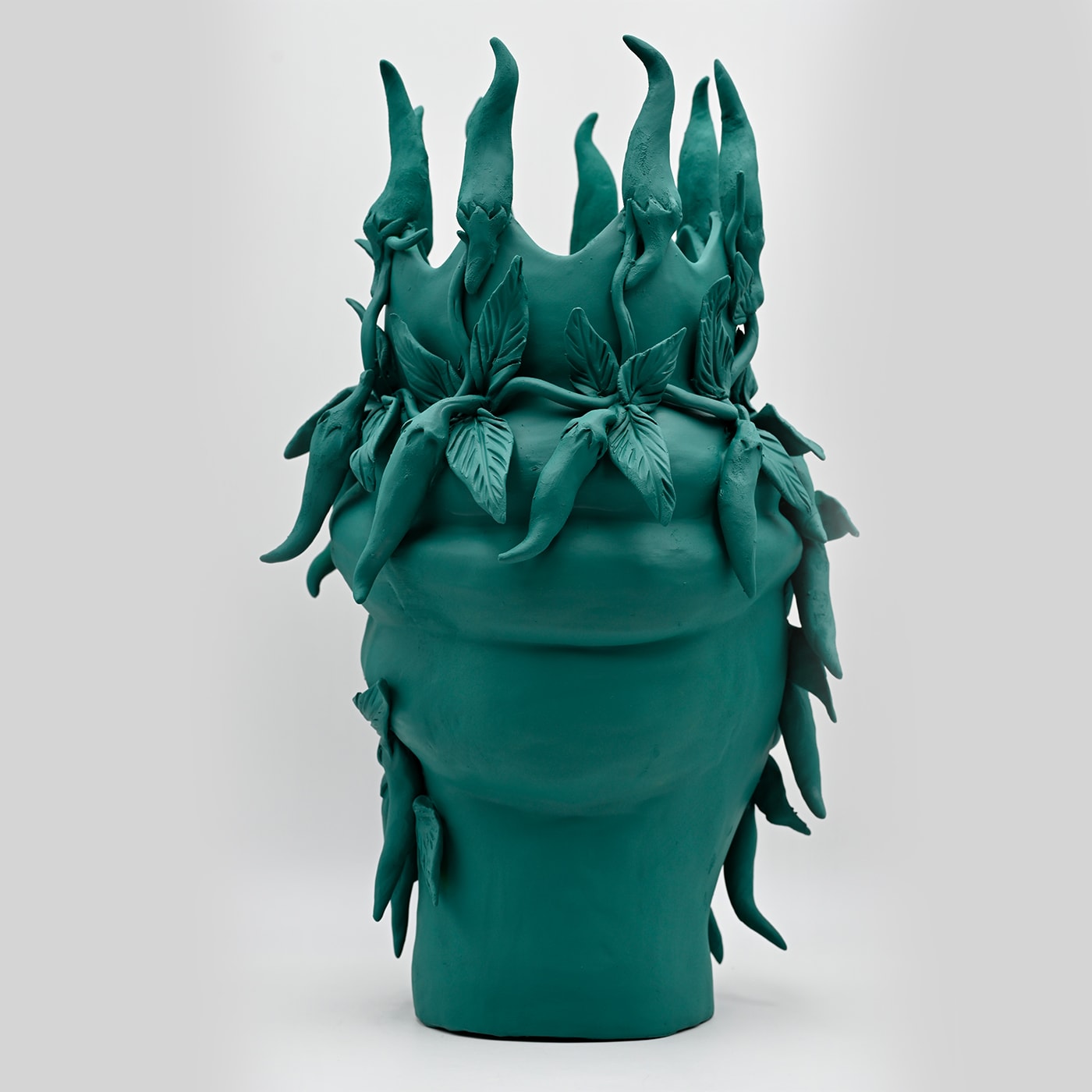 Maure‑Kopf dunkelgrüne Skulptur