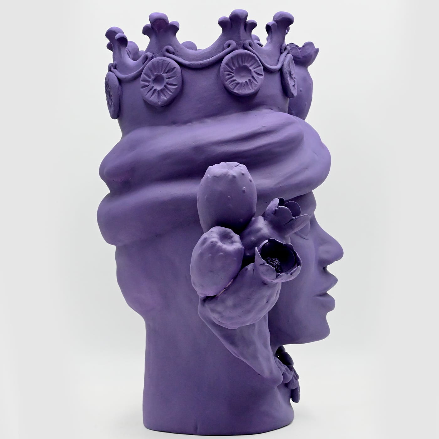 Maure‑Kopf violette Skulptur
