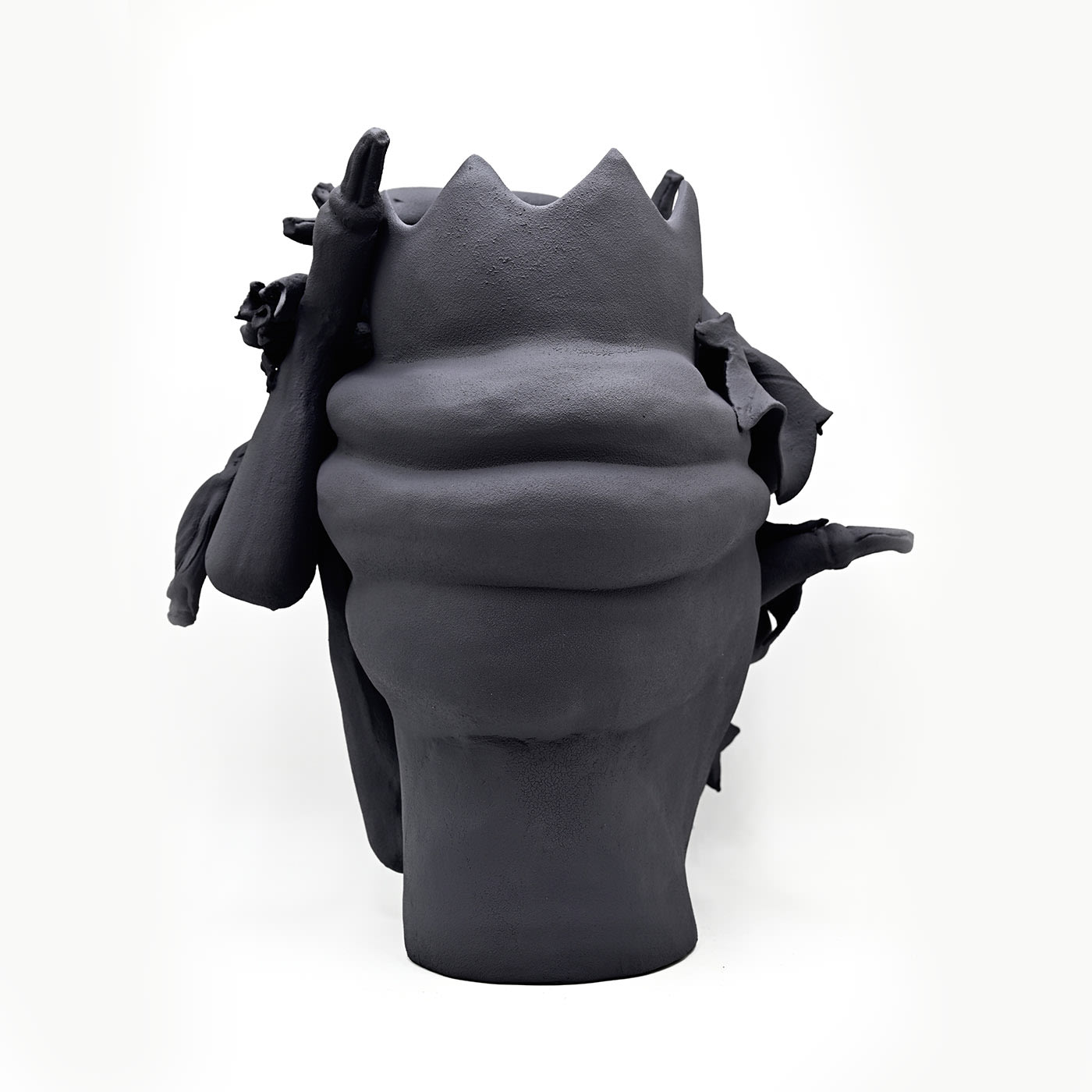 Maure‑Kopf graue Skulptur