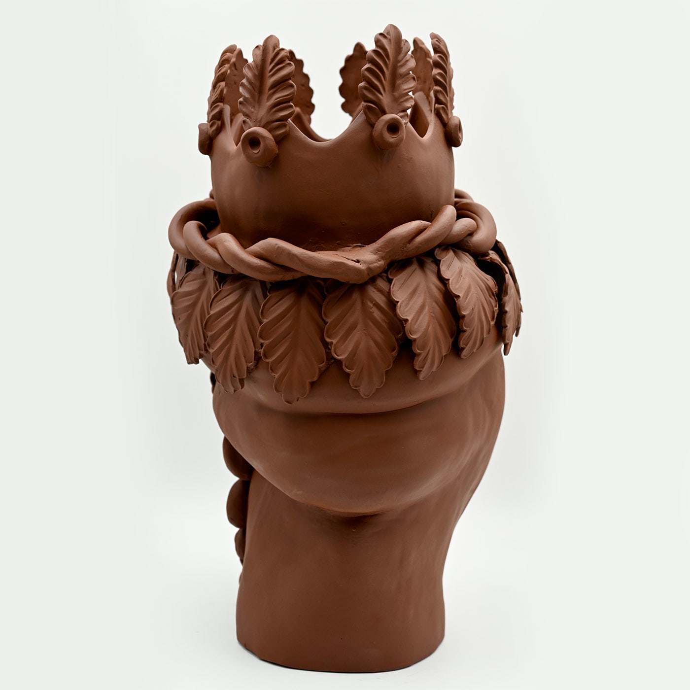 Maure‑Kopf braune Skulptur
