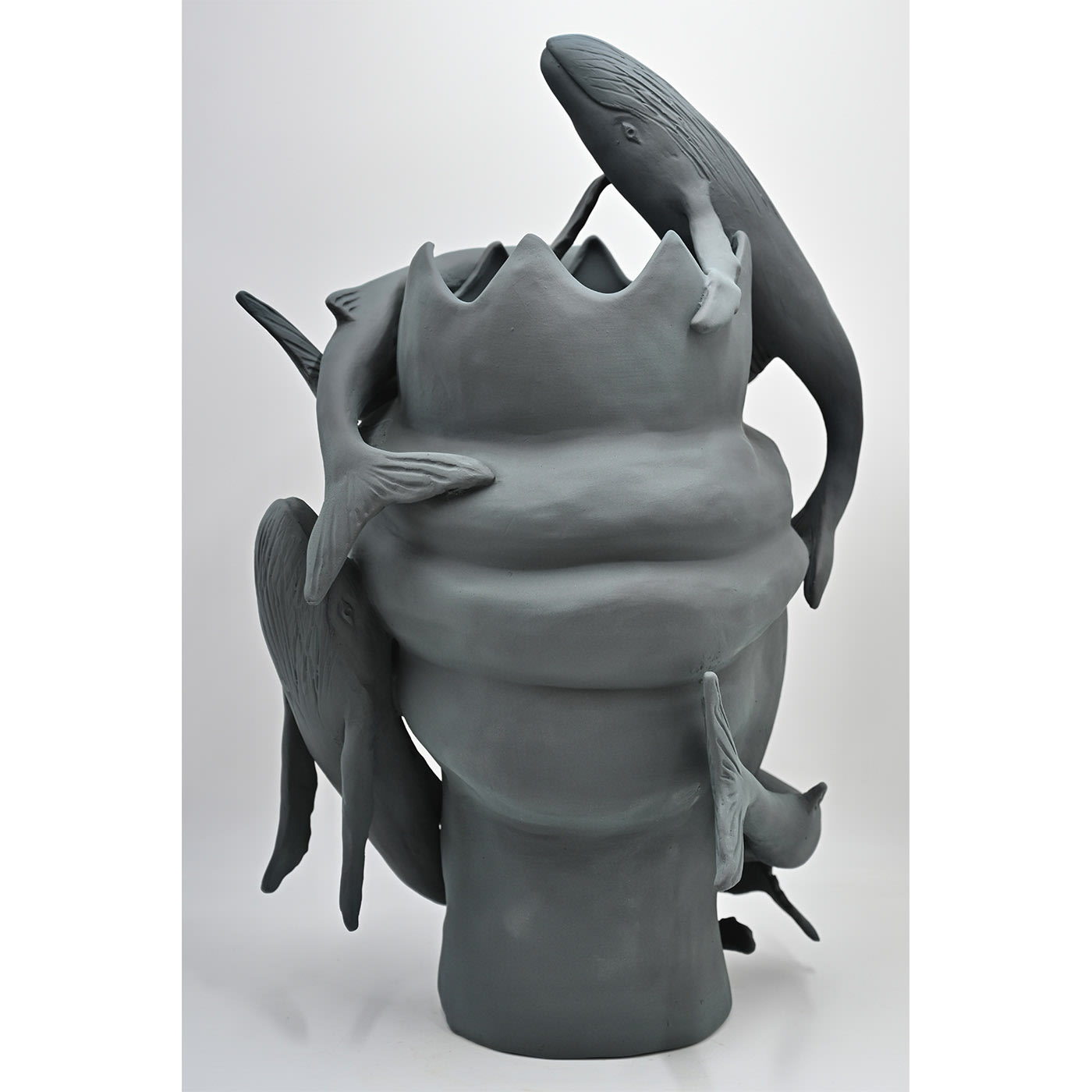 Maure‑Kopf graue Skulptur