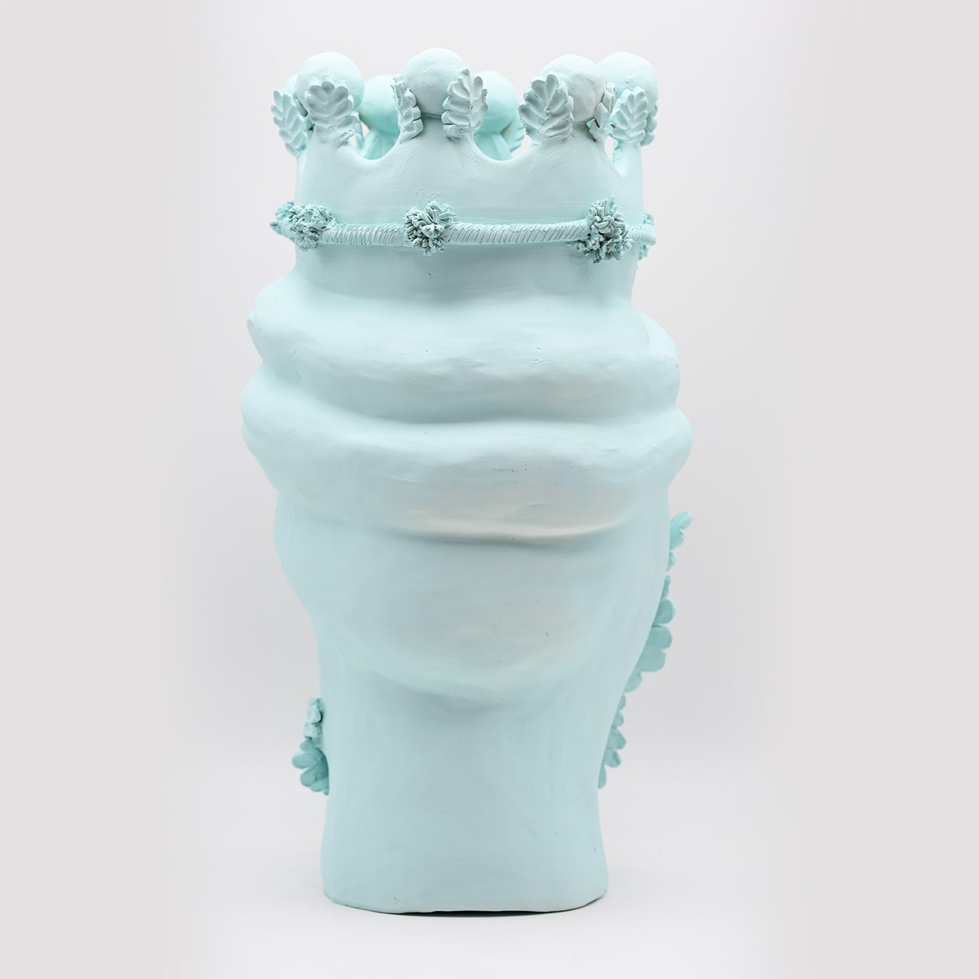 Maure‑Kopf himmelblaue Skulptur