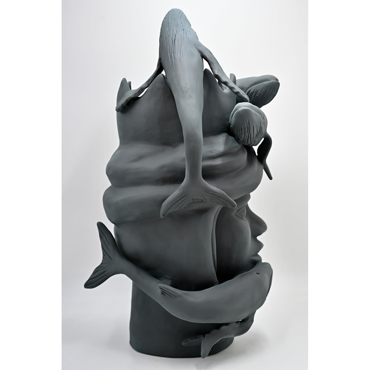 Maure‑Kopf graue Skulptur