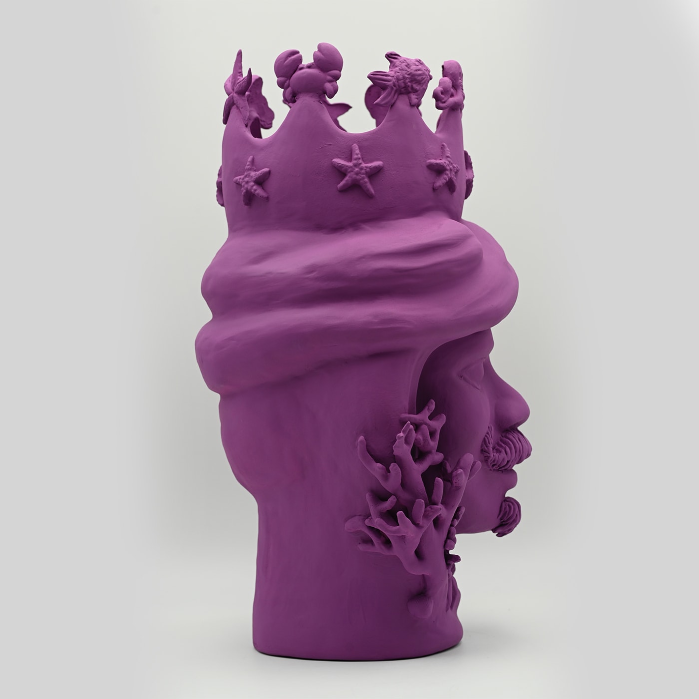 Maure‑Kopf lila Skulptur