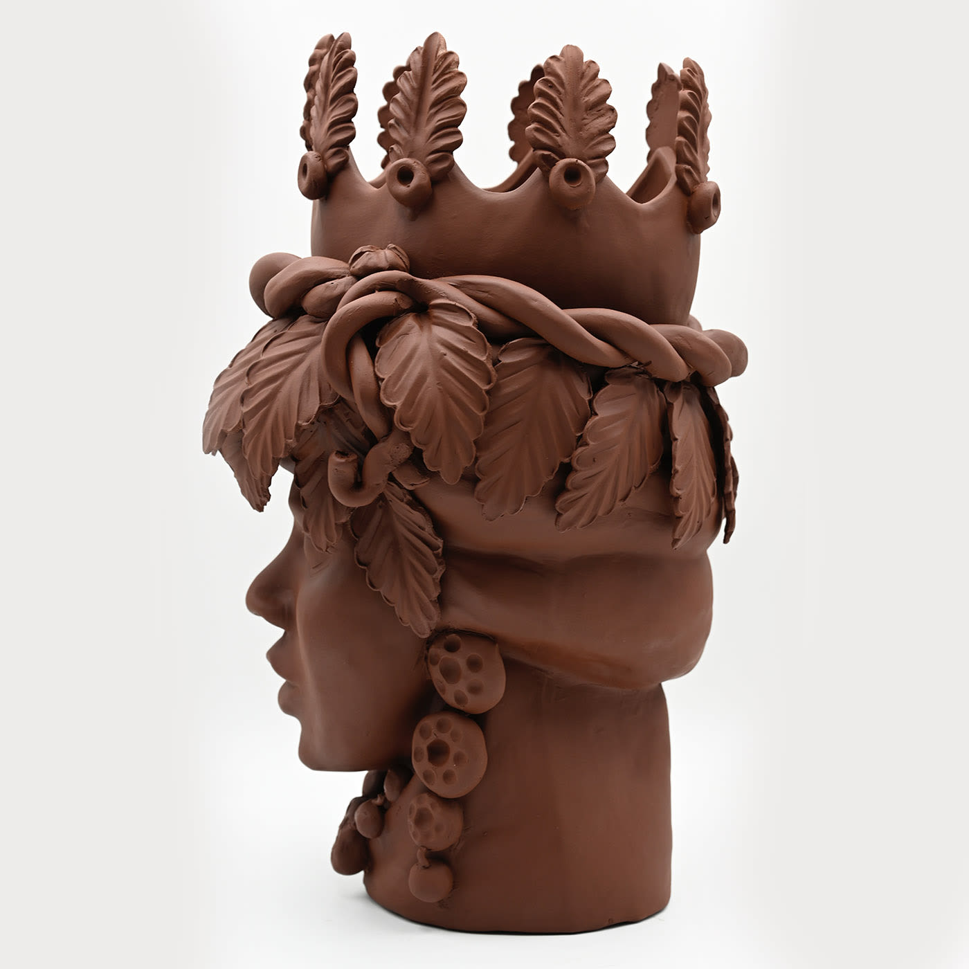 Maure‑Kopf braune Skulptur