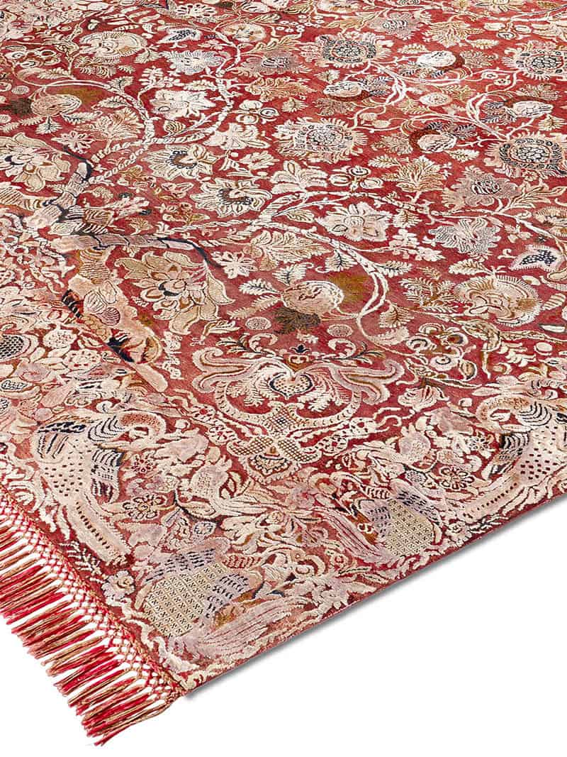 Original auf Rot-Orange-Mix Teppich