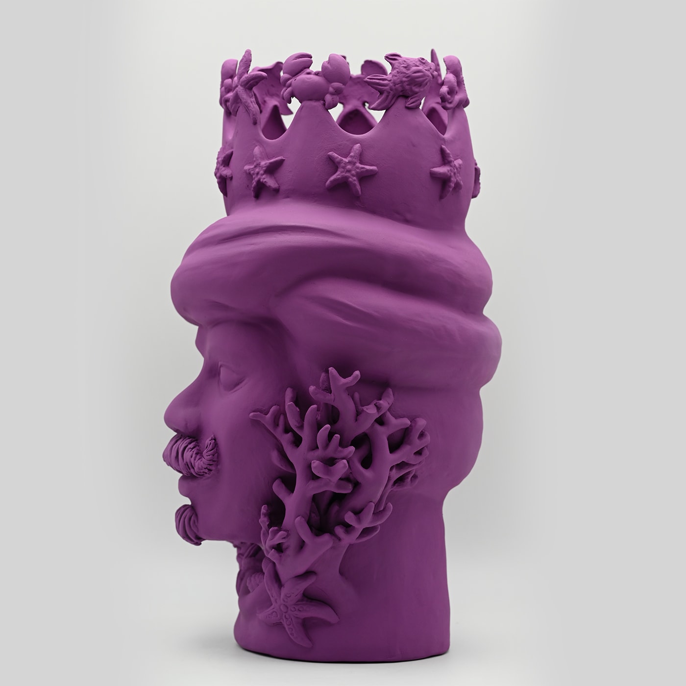 Maure‑Kopf lila Skulptur