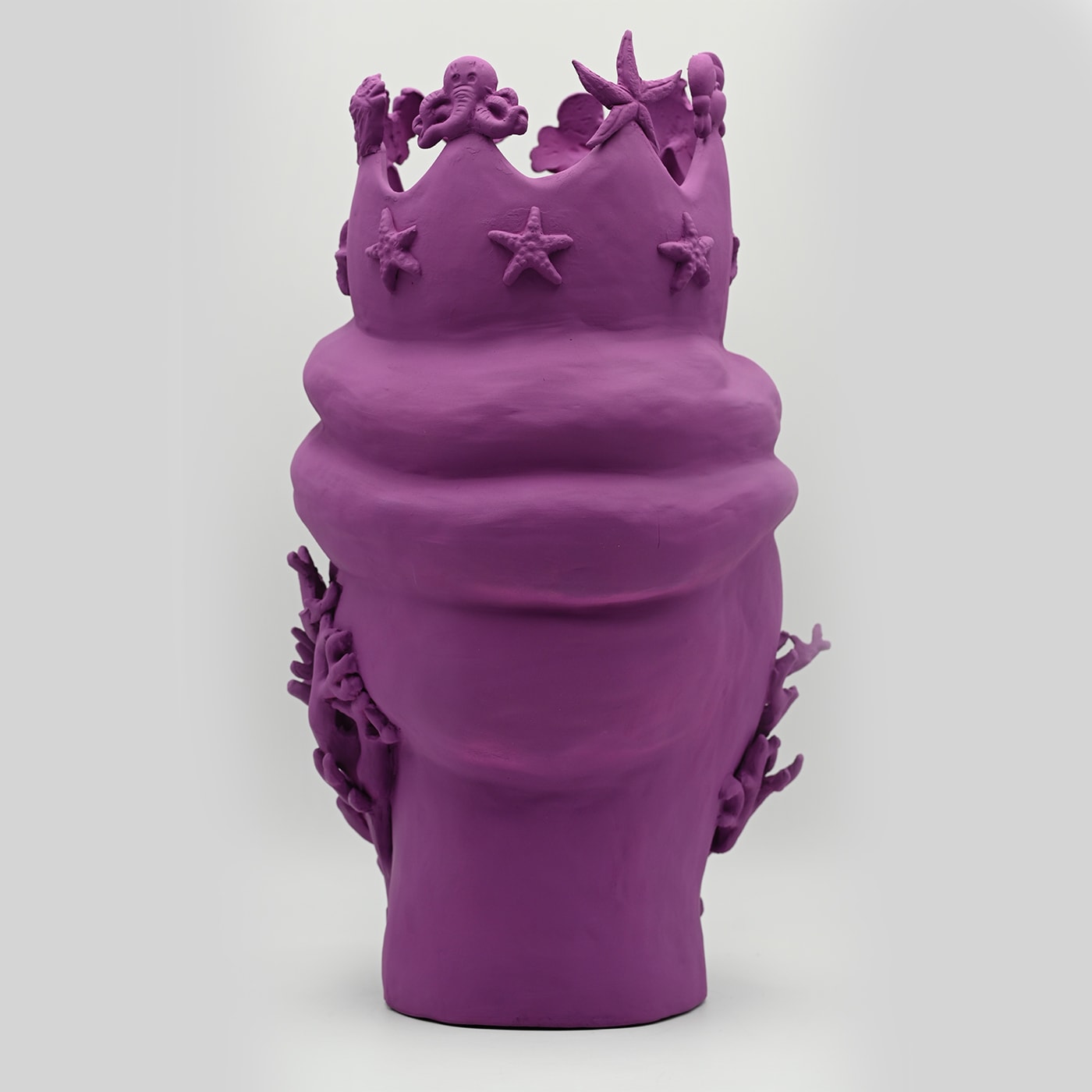 Maure‑Kopf lila Skulptur