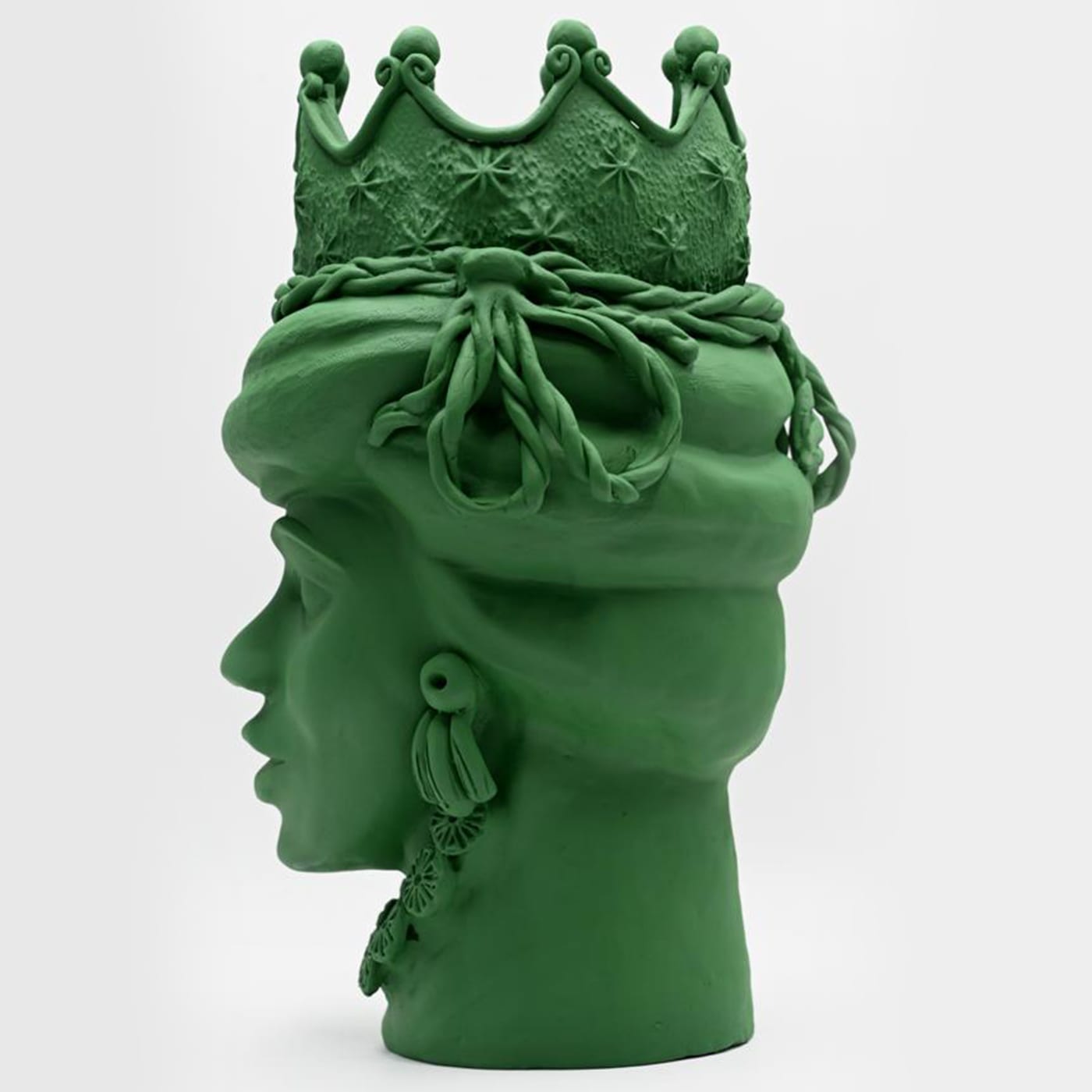 Maure‑Kopf grüne Skulptur