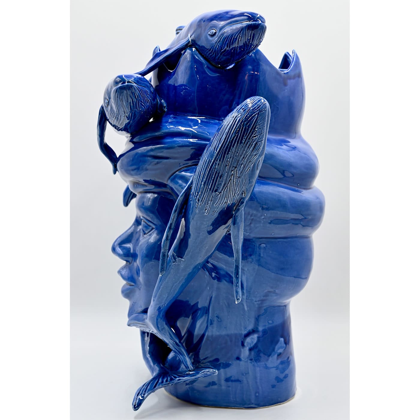 Maure‑Kopf glänzend blaue Skulptur