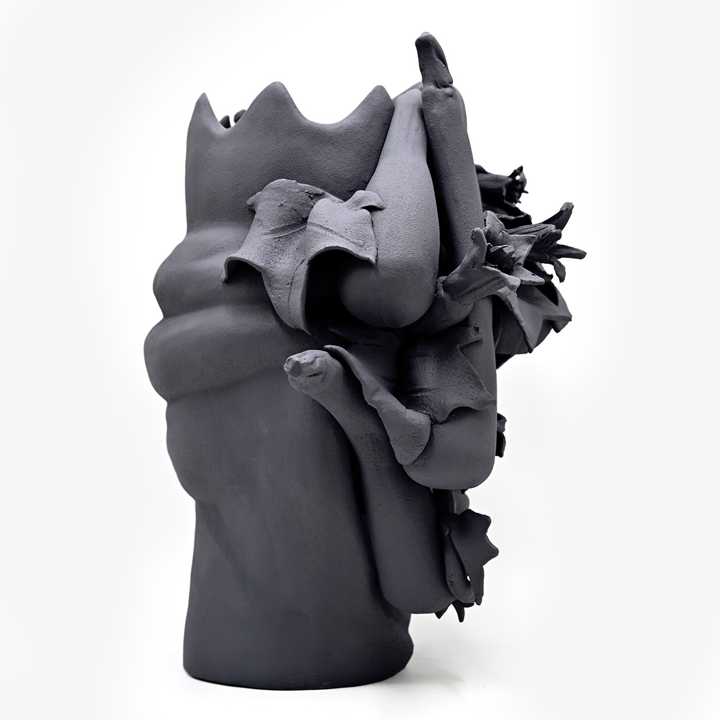 Maure‑Kopf graue Skulptur