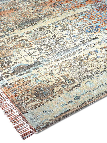 Woods Aqua auf Kupfer‑Orange Teppich