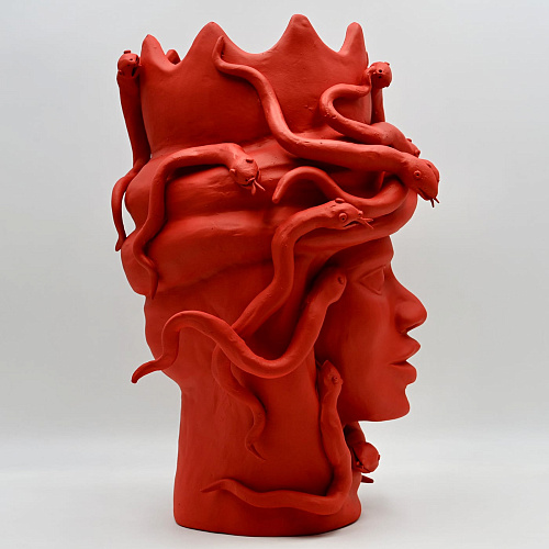 Maure‑Kopf rote Skulptur