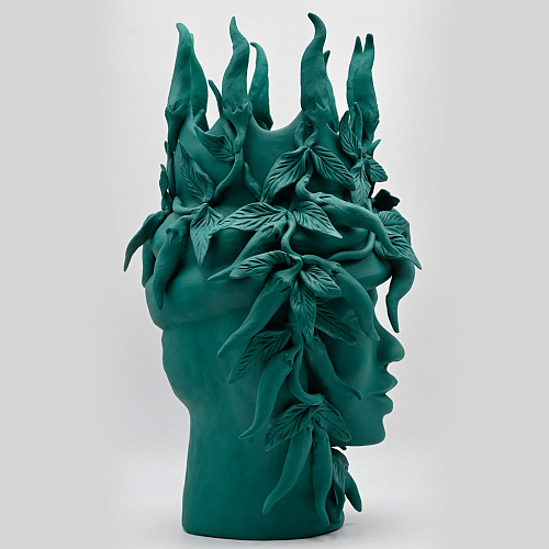 Maure‑Kopf dunkelgrüne Skulptur