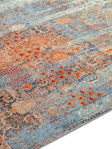 Woods Aqua auf Kupfer‑Orange Teppich
