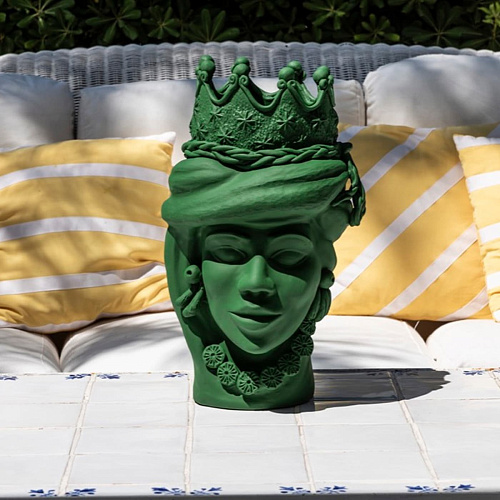 Maure‑Kopf grüne Skulptur